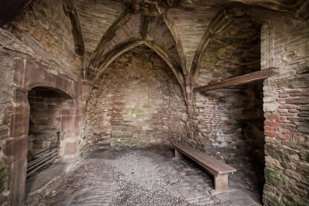 Vaulted stone chamber inside Ludlow Castle showing medieval interior architecture