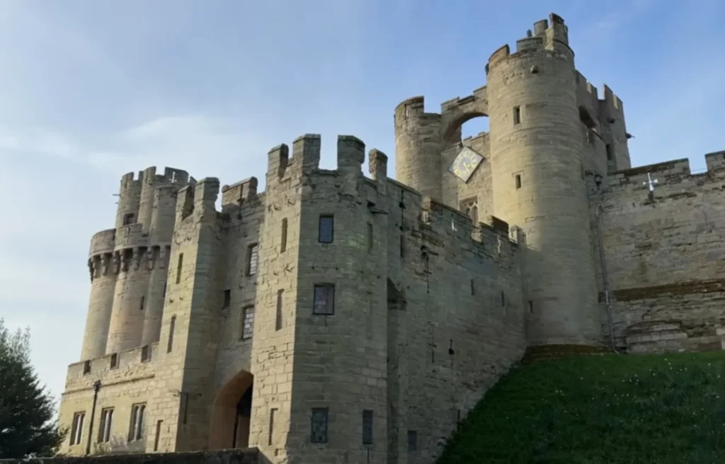 Warwick Castle gatehouse showing medieval towers and defensive stonework
